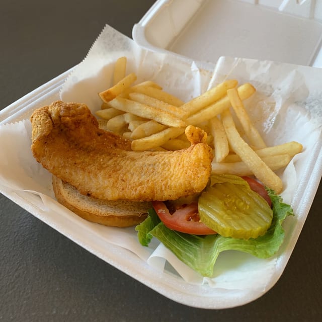 Fish sandwich with fries.